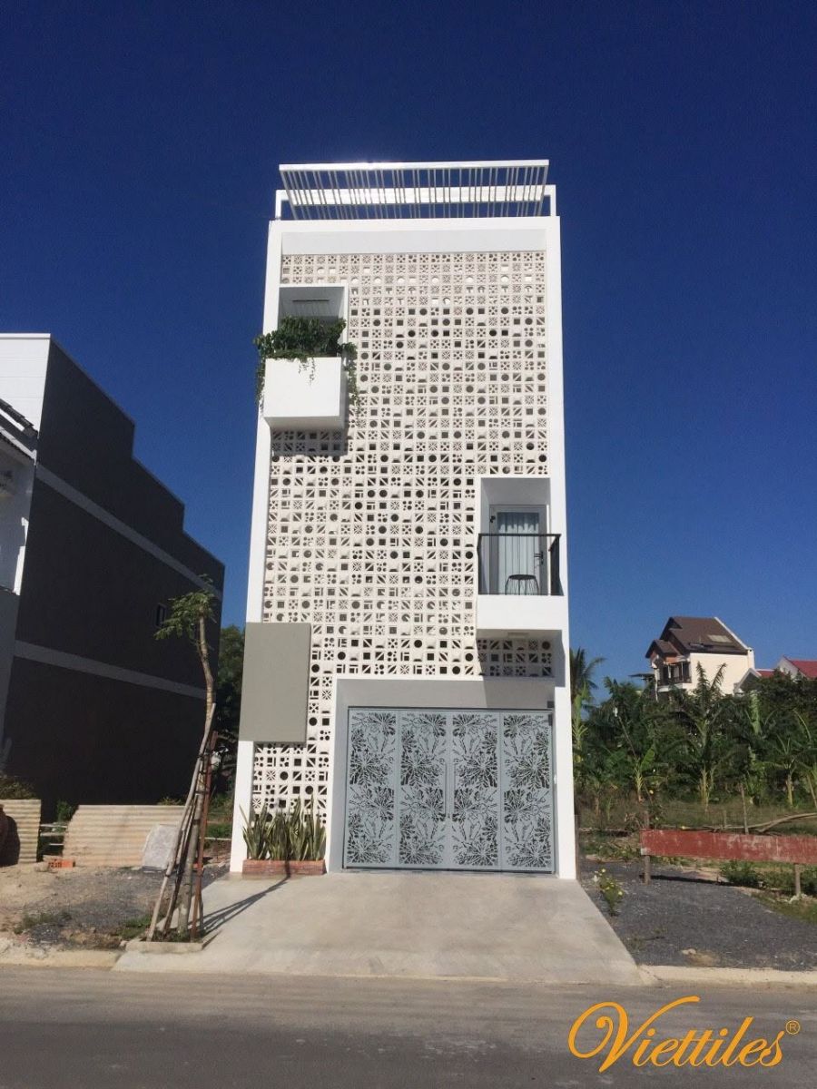 A ventilation block wall at the main entrance can help define the entryway, support airflow, and contribute to the overall security design.